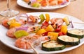 Colorful vegetable and shrimp grilled kebabs