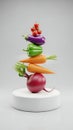 Colorful Vegetable Stack with Cherry Tomatoes and Onion on White Base Royalty Free Stock Photo