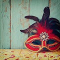 Colorful Venetian masquerade mask. selective focus. vintage filtered Royalty Free Stock Photo