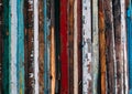 Colorful vertical lines, pile of wooden doors