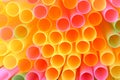 Colorful, vibrant abstract background of plastic straws. Macro shot, shallow depth of field