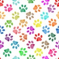 Colorful vibrant colored doodle paw prints. Seamless pattern for textile design. Paw prints white