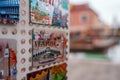 Colorful and Vibrant Display of Venice, Italy Postcards on Wall - Travel and Culture Concept