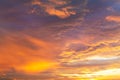 Colorful vibrant dramatic sky with purple to orange clouds. Sunset time. Beautiful nature background Royalty Free Stock Photo