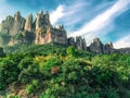 Colorful vibrant landscape of the Montserrat mountains in Catalonia Spain. Beautiful scenery with a bizarre mountain and green