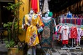 Colorful Vietnamese traditional dress for women and kids for sale in Hoi An, Vietnam