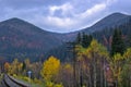 Colorful view of the slopes of wooded mountains in autumn. Royalty Free Stock Photo