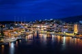 Colorful view of Voulismeni lake and Agios Nikolaos town on Crete island, Greece at dusk Royalty Free Stock Photo