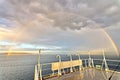 Colorful views of the rainbow against the sky, clouds and sea horizon. Commencement Bay,Tacoma,USA Royalty Free Stock Photo