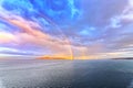 Colorful views of the rainbow against the sky, clouds and sea horizon. Commencement Bay,Tacoma,USA Royalty Free Stock Photo