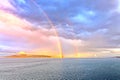 Colorful views of the rainbow against the sky, clouds and sea horizon. Commencement Bay,Tacoma,USA Royalty Free Stock Photo