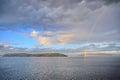 Colorful views of the rainbow against the sky, clouds and sea horizon. Commencement Bay,Tacoma,USA Royalty Free Stock Photo