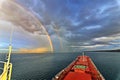 Colorful views of the rainbow against the sky, clouds and sea horizon. Commencement Bay,Tacoma,USA Royalty Free Stock Photo