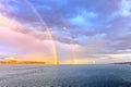 Colorful views of the rainbow against the sky, clouds and sea horizon. Commencement Bay,Tacoma,USA Royalty Free Stock Photo