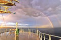 Colorful views of the rainbow against the sky, clouds and sea horizon. Commencement Bay,Tacoma,USA Royalty Free Stock Photo