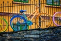 Colorful vintage bike on a wall Royalty Free Stock Photo