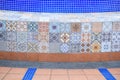 Colorful vintage ceramic tiles on cement wall decoration Royalty Free Stock Photo