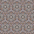 Colorful vintage triangles pattern with floral and mandala elements. For fabric, wallpaper, tile, wrapping, covers and carpet. Royalty Free Stock Photo