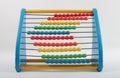 Colorful Vintage Wooden Childs Toy Abacus Against White Background Front View