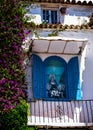 Colorful Virgin Mary on restaurant balcony Marbella Spain