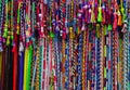 Colorful vivid multicolored string beaded clip in hair wraps made of yarn. Artisan had crafted goods. African style