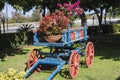 Colorful wain of flowers. Creative gardening Royalty Free Stock Photo