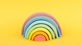 Colorful Waldorf wooden rainbow on yellow background, montessori teaching pedagogy