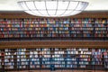Colorful wall of books on the shelfs at the rotunda in Stockholm Stadsbibliotek or Public Library Royalty Free Stock Photo