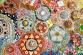 Colorful wall decorated with multicolor stone, gravel and gem for background at Wat Phra That Pha Son Kaew.