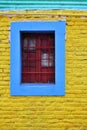 Colorful wall and grilled window Royalty Free Stock Photo