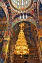 Church wall painting and chandelier in the middle