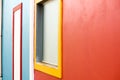 Colorful wall with yellow window Royalty Free Stock Photo