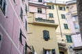 Colorful walls of Italy with beautiful shutters and pastel colors Royalty Free Stock Photo