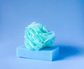 Colorful washcloths on a blue background. Accessories for body care and hygiene