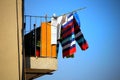 Colorful washing or laundry hanging out to dry in the sun on a b Royalty Free Stock Photo