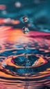 Colorful water droplets suspended over a ripple