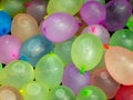 Colorful water-filled balloons prepared for summer children camp play Royalty Free Stock Photo