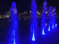 Colorful Water Fountain Blue Lights at Night Royalty Free Stock Photo