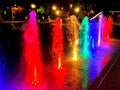 Colorful Water Fountain Jets at Night Royalty Free Stock Photo