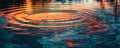 Colorful water ripples at sunset Royalty Free Stock Photo