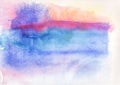 Colorful watercolor splash on white paper Royalty Free Stock Photo