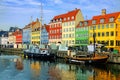 Historic Nyhavn canal with reflections, Copenhagen, Denmark Royalty Free Stock Photo