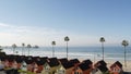 Cottages in Oceanside California USA. Beachfront bungalows. Ocean beach palm trees. Summer seascape.