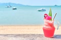 Colorful watermelon mocktail at the beach bar. Vacation, get away, summer outing concept