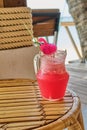 Colorful watermelon mocktail at the beach bar. Vacation, get away, summer outing concept Royalty Free Stock Photo