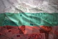 Colorful waving bulgarian flag on a euro background