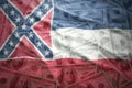 Colorful waving mississippi state flag on a american dollar money background Royalty Free Stock Photo
