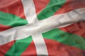 Colorful waving national flag of basque country on a euro money banknotes background. Royalty Free Stock Photo