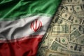 colorful waving national flag of iran on a american dollar money background. finance concept Royalty Free Stock Photo