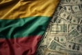 colorful waving national flag of lithuania on a american dollar money background. finance concept Royalty Free Stock Photo